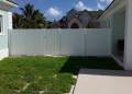 Lakeland Privacy Fence - Green & White House